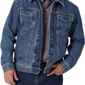 a man in pose with one hand in pocket wearing wrangler denim jacket cowboy cut